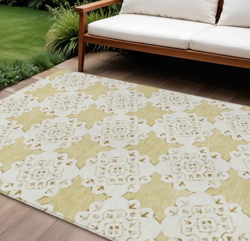 Wheat And Ivory Quatrefoil Washable Indoor Outdoor Area Rug Photo 1