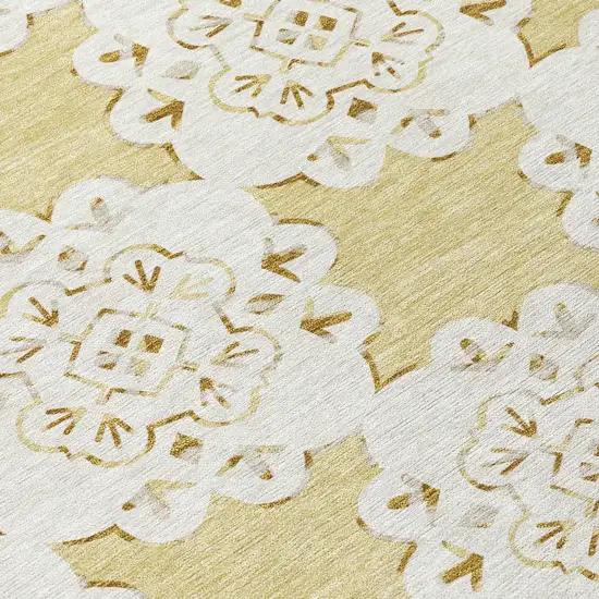 Wheat And Ivory Quatrefoil Washable Indoor Outdoor Area Rug Photo 9