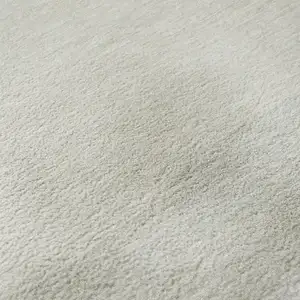 Photo of Wheat And Ivory Striped Washable Area Rug With UV Protection