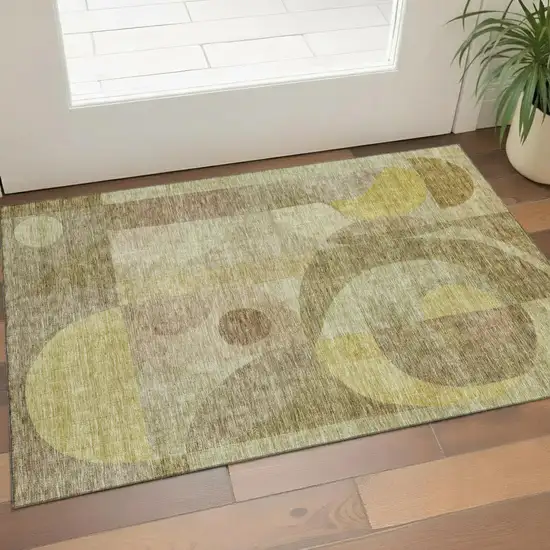 Wheat Beige And Gold Abstract Geometric Washable Area Rug With UV Protection Photo 1