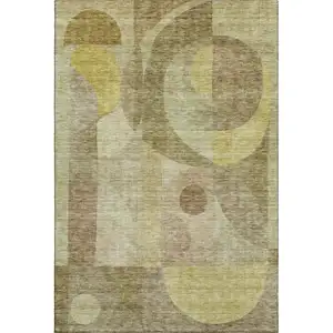 Photo of Wheat Beige And Gold Abstract Geometric Washable Area Rug With UV Protection