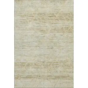 Photo of Wheat Beige And Gold Abstract Geometric Washable Area Rug With UV Protection