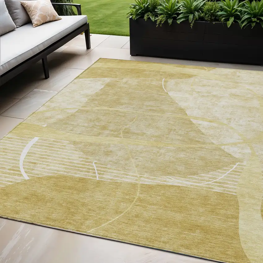 Wheat Gold And Ivory Abstract Washable Indoor Outdoor Area Rug Photo 1