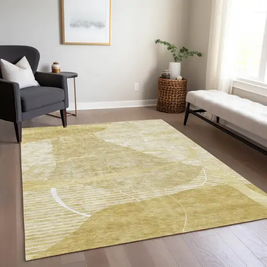 Wheat Gold And Ivory Abstract Washable Indoor Outdoor Area Rug Photo 9