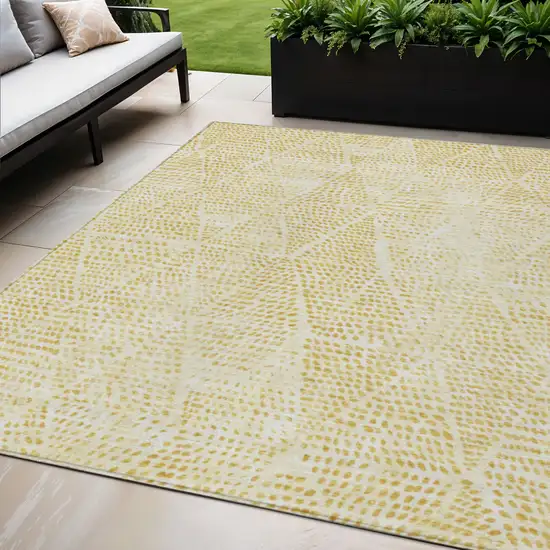 Wheat Gold And Ivory Geometric Washable Indoor Outdoor Area Rug Photo 1