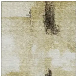Photo of Wheat Green And Black Abstract Washable Indoor Outdoor Area Rug
