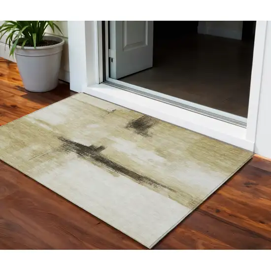 Wheat Green And Black Abstract Washable Indoor Outdoor Area Rug Photo 1