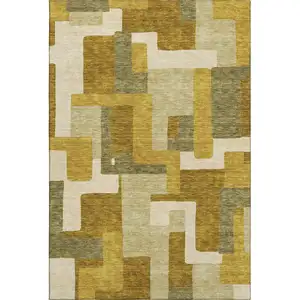 Photo of Wheat Ivory And Gold Geometric Washable Area Rug With UV Protection