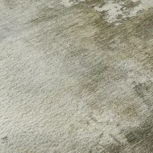 Photo of Wheat Ivory And Taupe Abstract Washable Area Rug With UV Protection