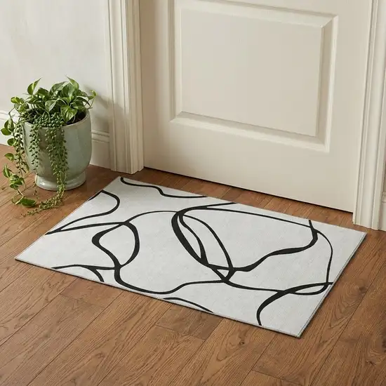 White And Black Abstract Washable Area Rug With UV Protection Photo 1