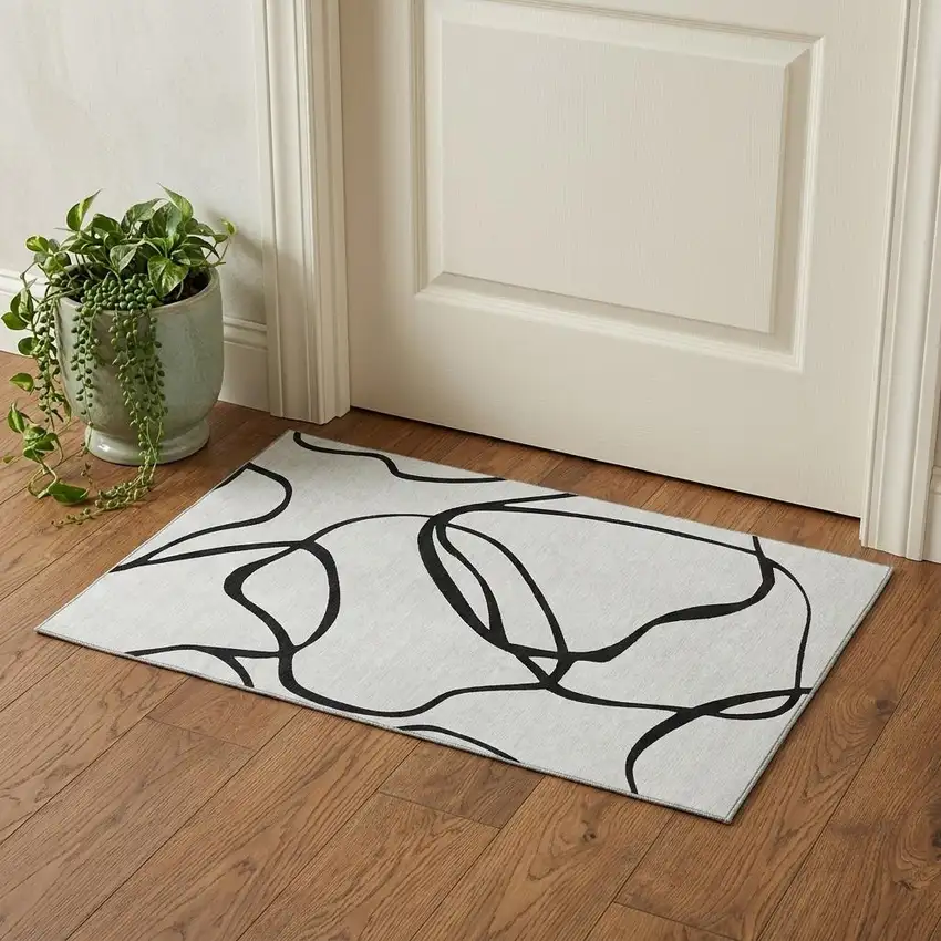 White And Black Abstract Washable Area Rug With UV Protection Photo 1