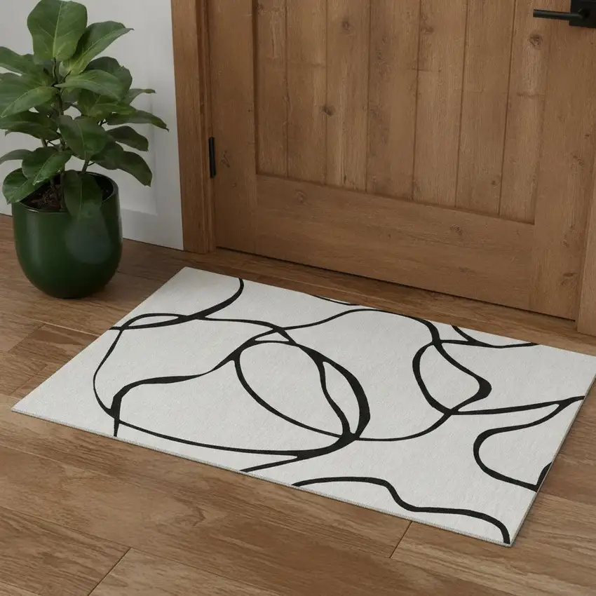 White And Black Abstract Washable Area Rug With UV Protection Photo 1