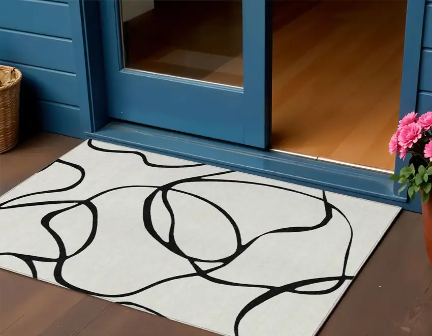 White And Black Abstract Washable Indoor Outdoor Area Rug Photo 1