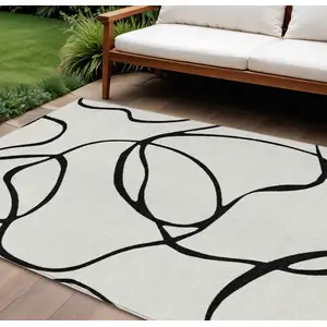 Photo of White And Black Abstract Washable Indoor Outdoor Area Rug