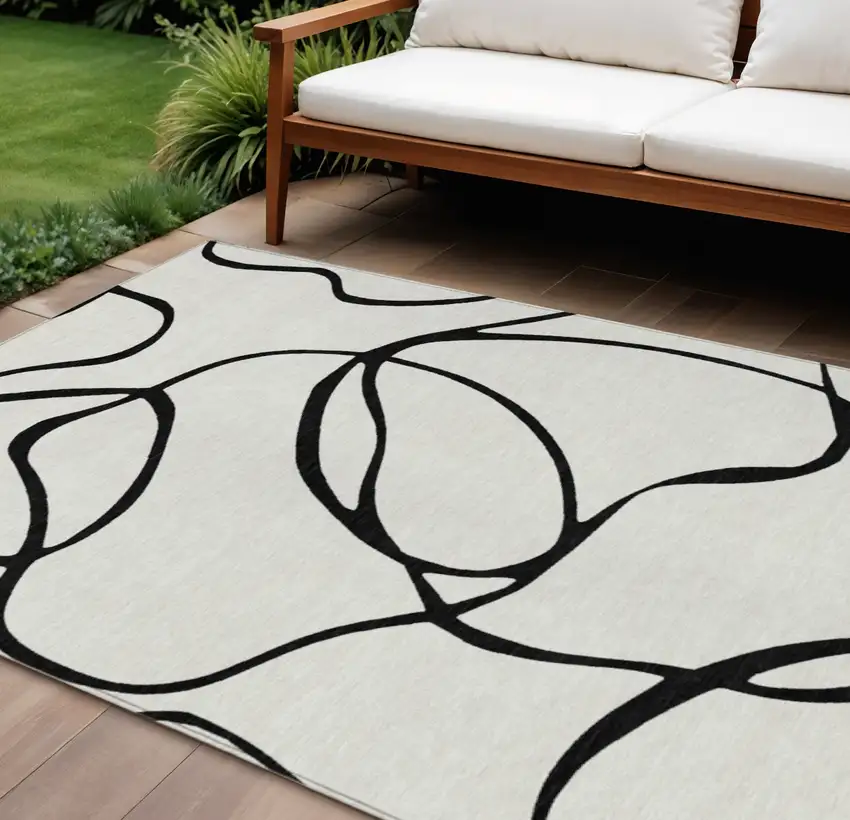 White And Black Abstract Washable Indoor Outdoor Area Rug Photo 1