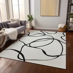 Photo of White And Black Abstract Washable Indoor Outdoor Area Rug