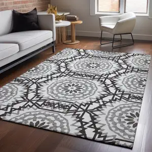 Photo of White And Black Geometric Washable Area Rug With UV Protection