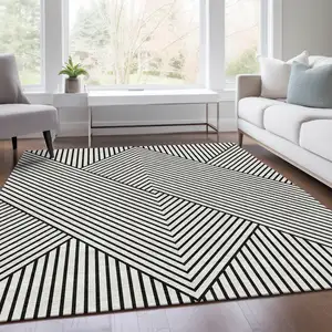 Photo of White And Black Geometric Washable Area Rug With UV Protection