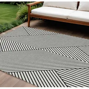 Photo of White And Black Geometric Washable Indoor Outdoor Area Rug