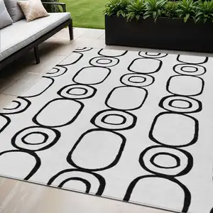 Photo of White And Black Geometric Washable Indoor Outdoor Area Rug