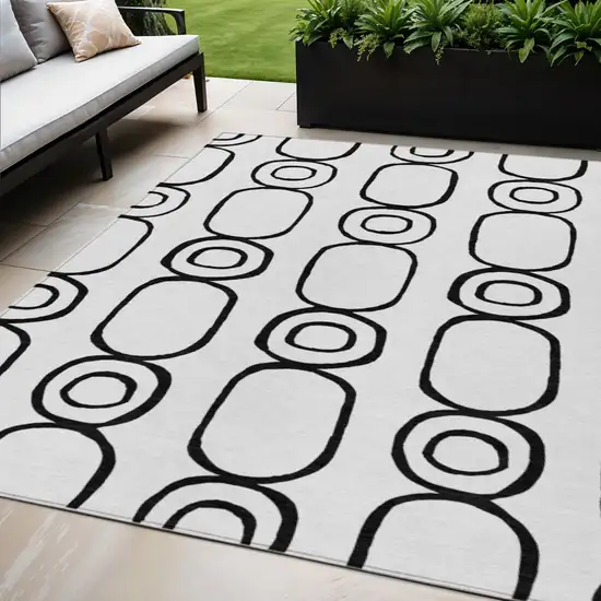 White And Black Geometric Washable Indoor Outdoor Area Rug Photo 1