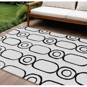 Photo of White And Black Geometric Washable Indoor Outdoor Area Rug