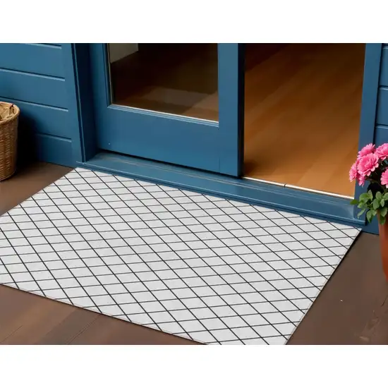 White And Black Geometric Washable Indoor Outdoor Area Rug Photo 1