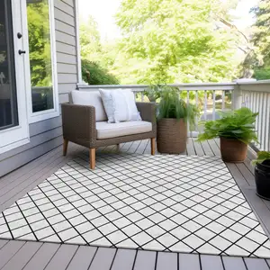 Photo of White And Black Geometric Washable Indoor Outdoor Area Rug