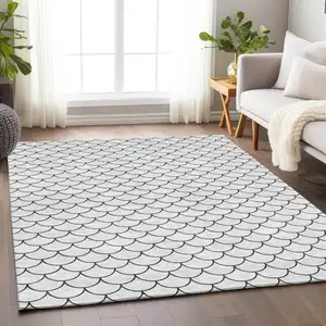Photo of White And Black Geometric Washable Indoor Outdoor Area Rug