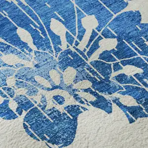 Photo of White And Blue Floral Washable Area Rug With UV Protection