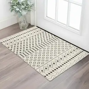 Photo of White And Charcoal Geometric Area Rug