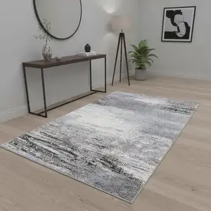 Photo of White And Gray Abstract Area Rug