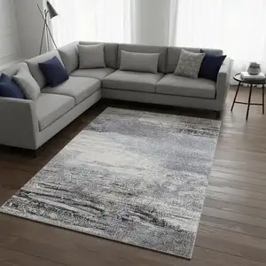 Photo of White And Gray Abstract Area Rug
