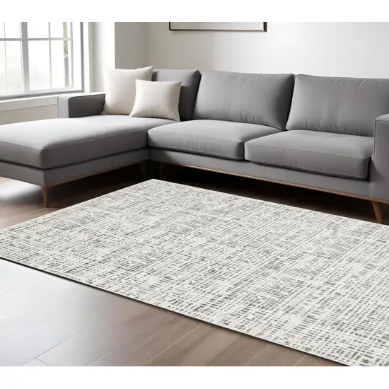 White And Gray Abstract Distressed Area Rug Photo 1