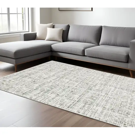 White And Grey Abstract Power Loom Stain Resistant Area Rug Photo 1
