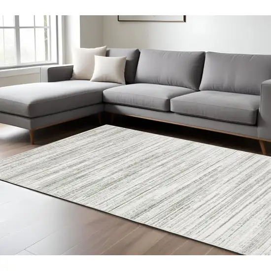 White And Gray Abstract Distressed Area Rug Photo 1