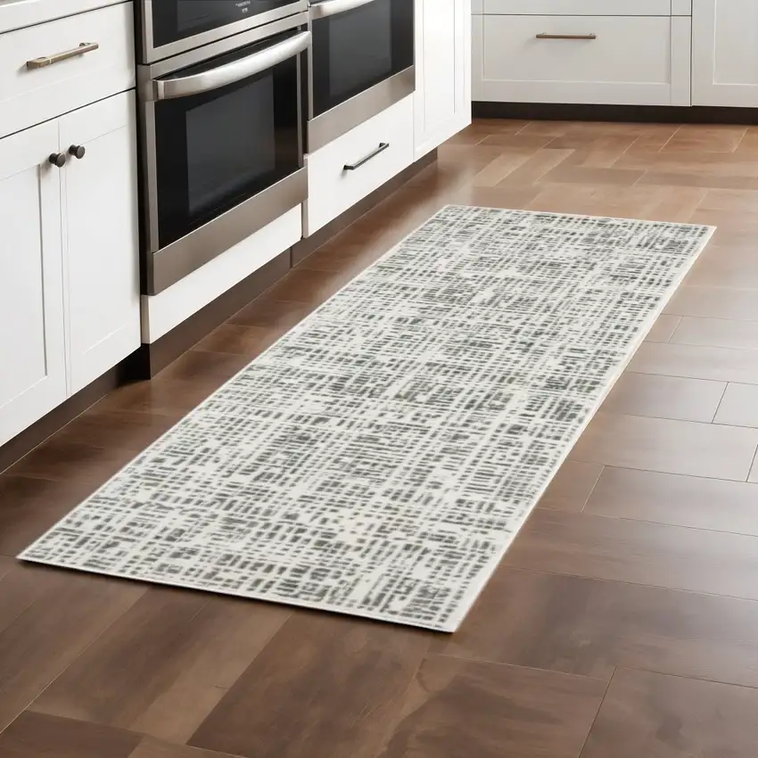 2' X 8' White And Grey Abstract Power Loom Stain Resistant Runner Rug Photo 1