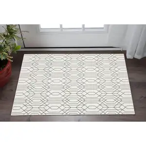 Photo of White And Grey Geometric Power Loom Stain Resistant Area Rug