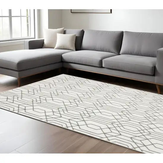 6' X 9' White And Grey Geometric Power Loom Stain Resistant Area Rug Photo 1