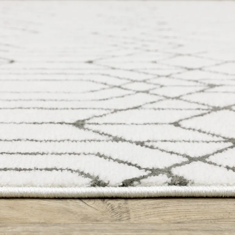 White And Grey Geometric Power Loom Stain Resistant Area Rug Photo 1
