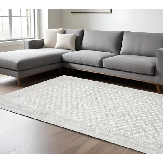 White And Gray Oriental Distressed Area Rug Photo 1
