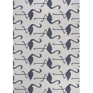 Photo of White And Navy Blue Animal Print Indoor Outdoor Area Rug