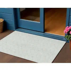 Photo of White Aqua And Copper Geometric Washable Indoor Outdoor Area Rug