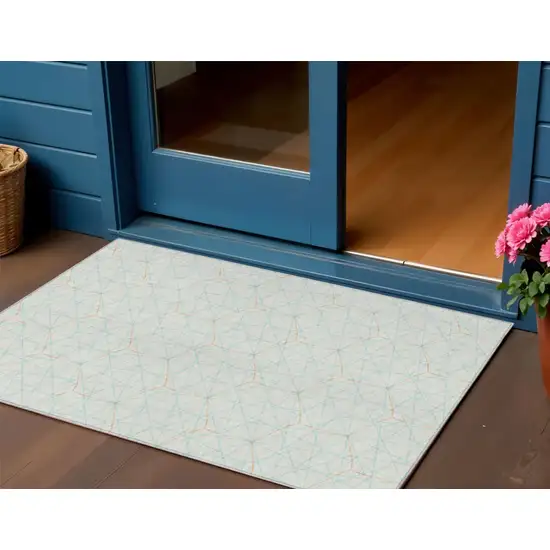 White Aqua And Copper Geometric Washable Indoor Outdoor Area Rug Photo 1