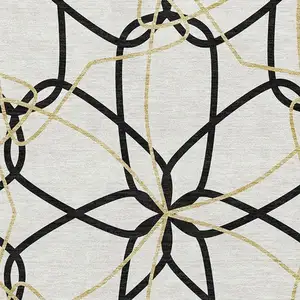 Photo of White Black And Gold Geometric Washable Area Rug With UV Protection