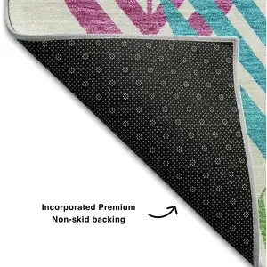 Photo of White Orange And Blue Floral Washable Area Rug With UV Protection