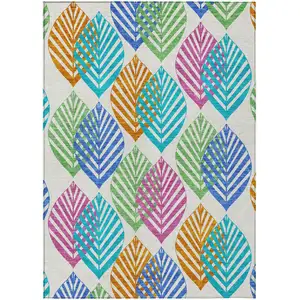 Photo of White Orange And Blue Floral Washable Indoor Outdoor Area Rug