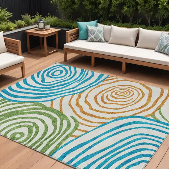 White Orange And Teal Blue Abstract Washable Indoor Outdoor Area Rug Photo 1