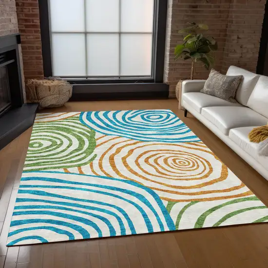 White Orange And Teal Blue Abstract Washable Indoor Outdoor Area Rug Photo 9