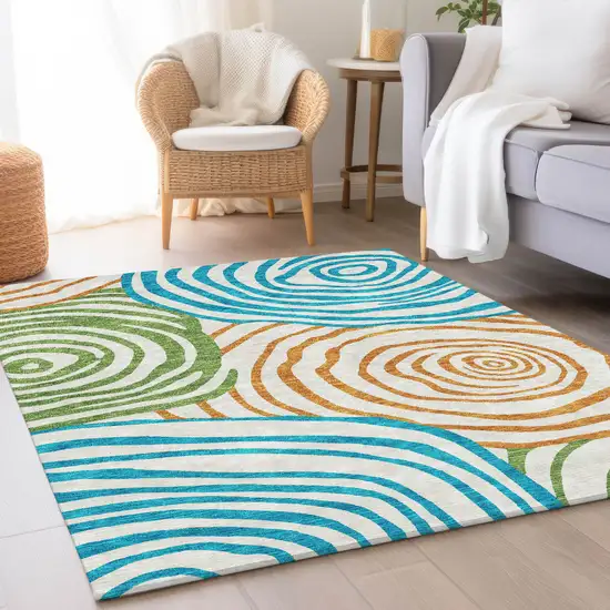 White Orange And Teal Blue Abstract Washable Indoor Outdoor Area Rug Photo 8